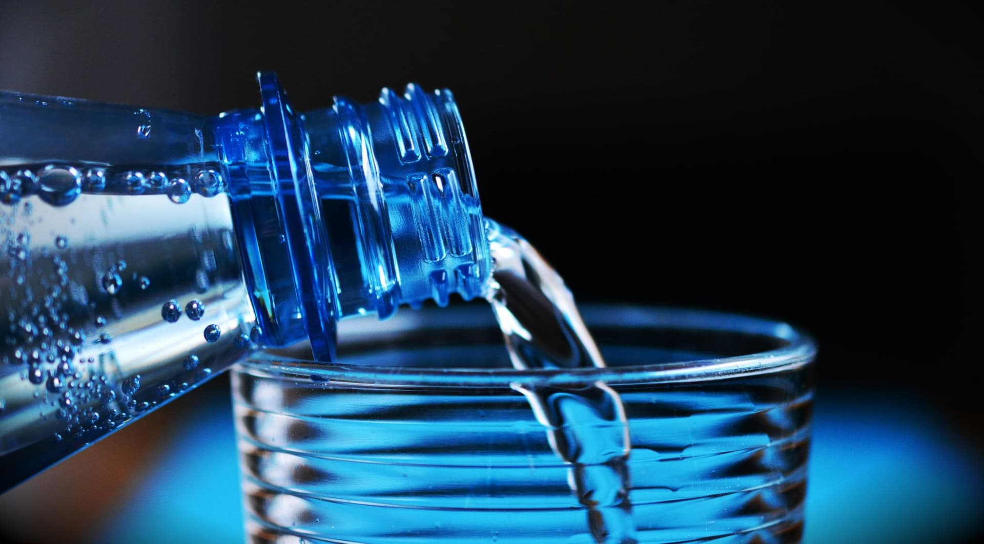 Bhagirathi alkaline water poured into a glass